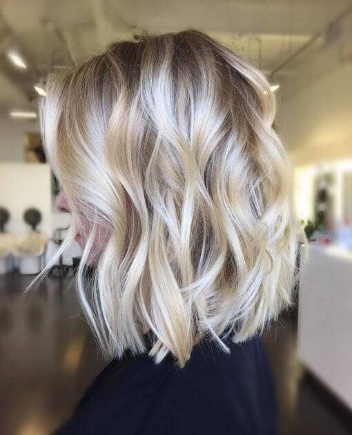 Wavy blonde hair color down the sides