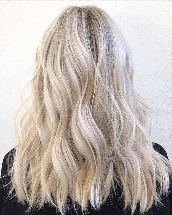 Free flowing style blonde hair color