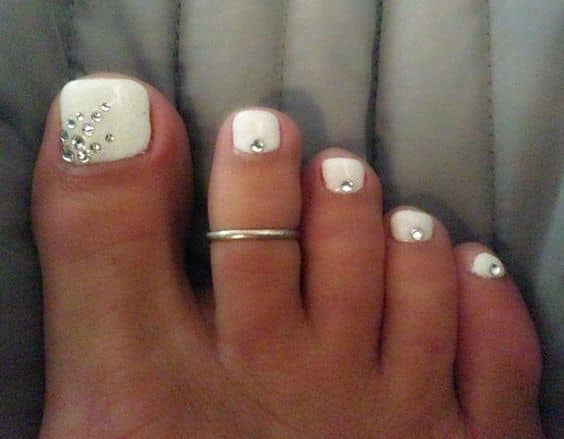 3. Silver and White Toe Nail Design - wide 6