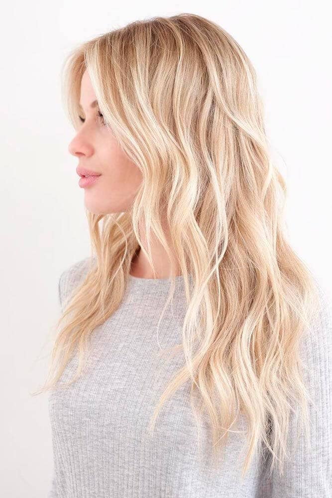 Medium sized blonde hair with mysterious side brush