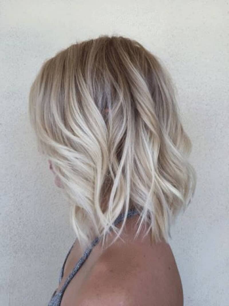 Curly Strands with Interesting Blonde Highlights