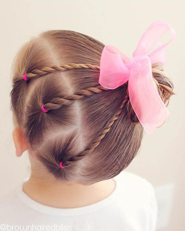 The Pink Bowed Ballerina Twirls