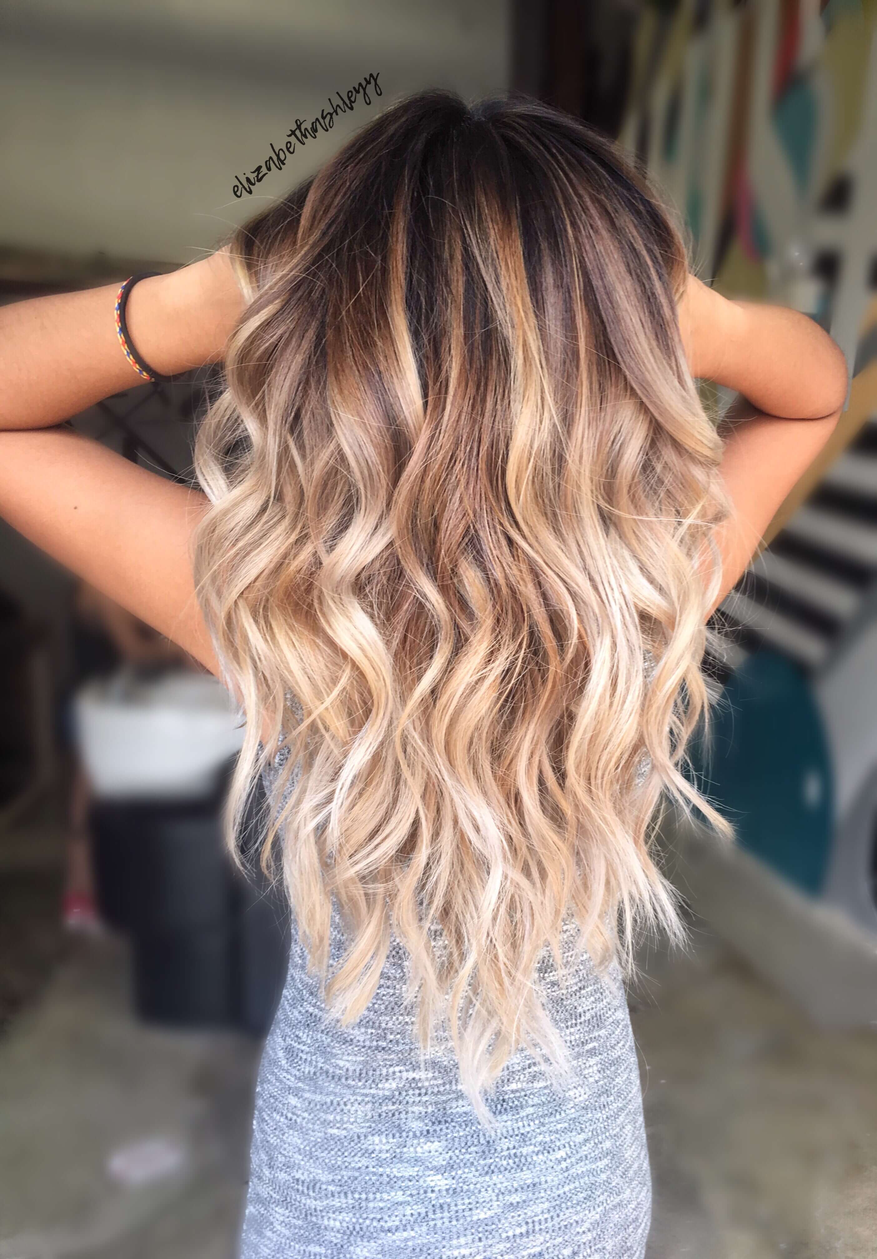 Warmer tone ombre that fades to icy tips