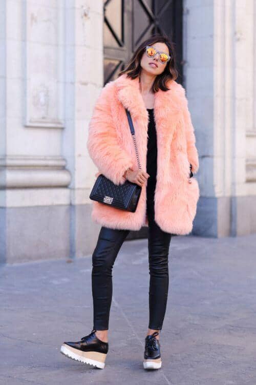 Pastel Neon Pink Fur Over Black Pants And Top