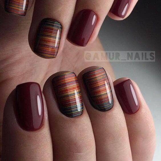 Maroon Manicure with Saturn Rings