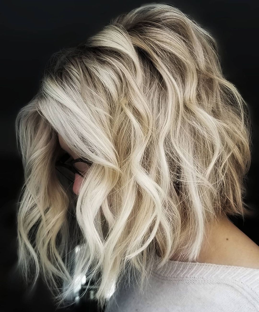 Platinum Blonde Hair Over-the-Shoulder Lob with Exposed Roots Short Blonde Hair