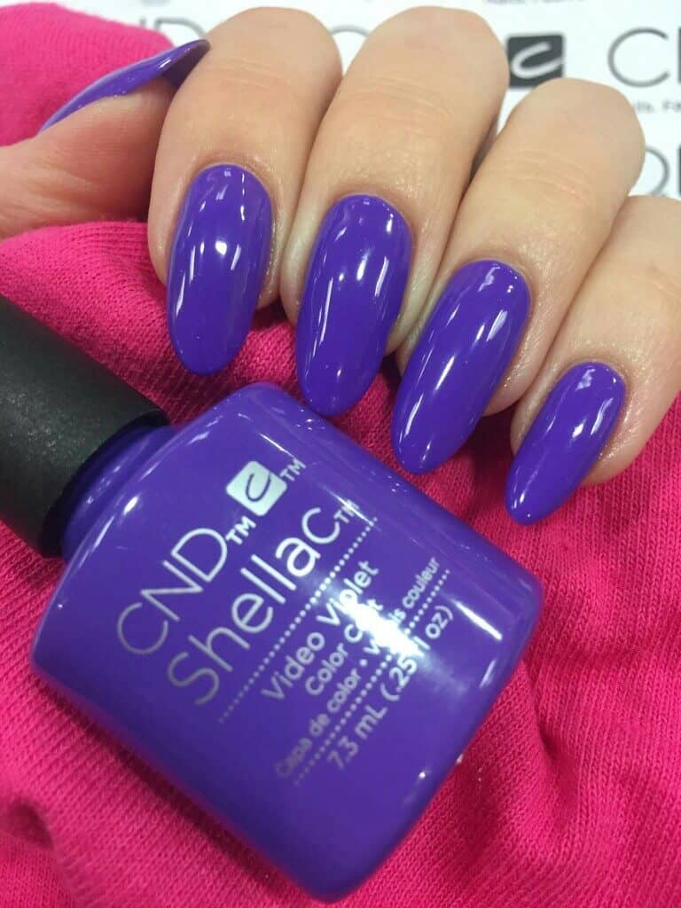 Vibrant Violet Stiletto Nail Manicure