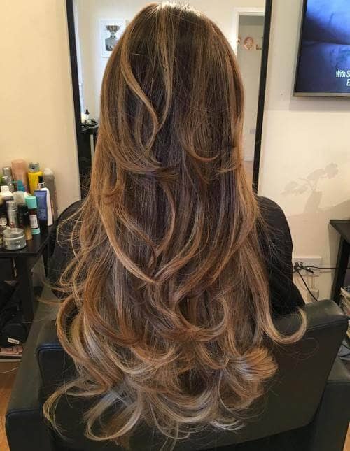 Long Layered Hair in Bouncy Curls Medium Length Hair