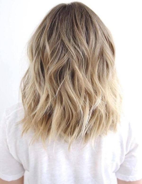 Flirty and Fun Blonde Highlights