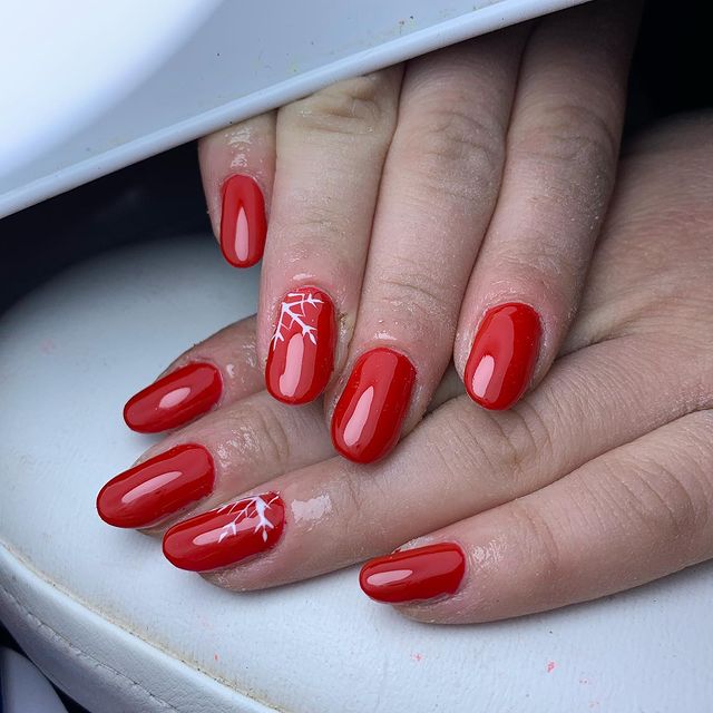 Candy Cane Red Nails with Snowflakes Gel Nails