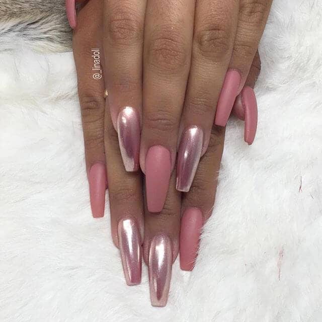 A Long Nail Design with Pink Flair