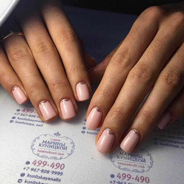 Soft Pink and Glitter Accented Nails