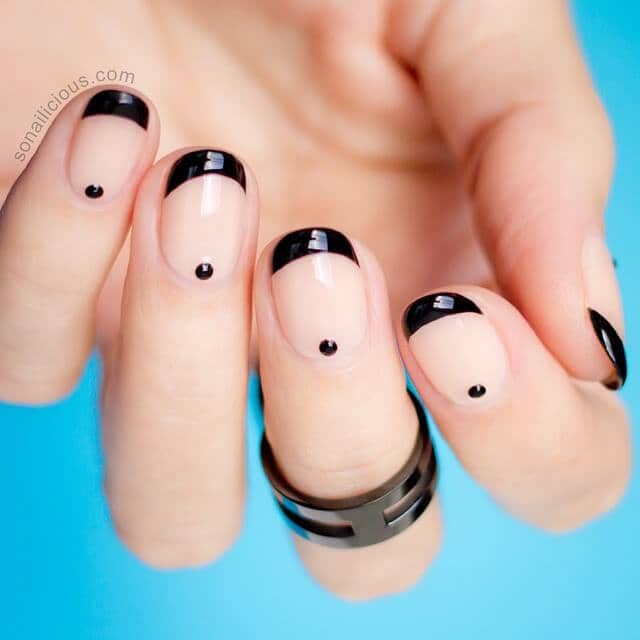 Barely-there black accents oval nails