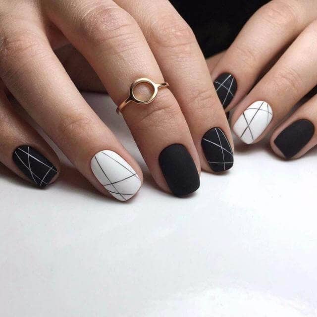 Black and white nails with modernist lines