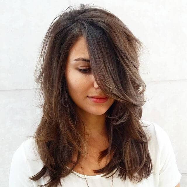 Long Layered Side Swept Bangs with Soft Waves