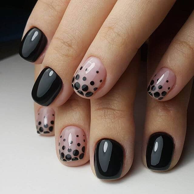 Polka dots with a twist- pink and black short nail design