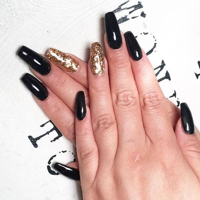 Gold Dust Woman- black with a gold accent long acrylic nails