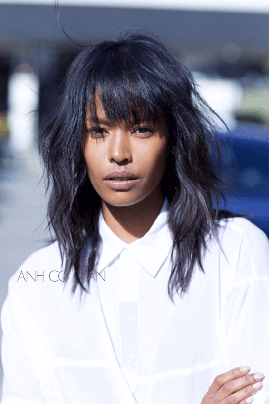Spiky Asymmetrical Bangs Style with Loose Waves