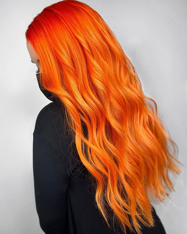 Vibrant Orange Hair With Soft Waves