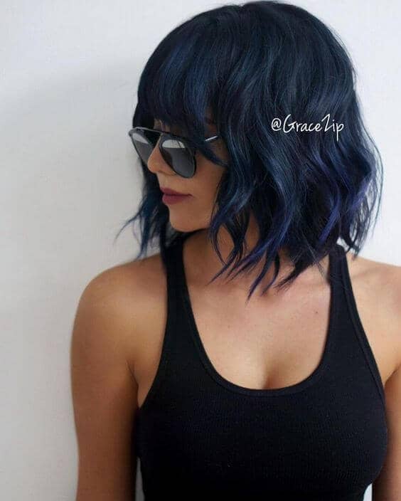 Wavy Navy Blue Hairstyle With Bangs