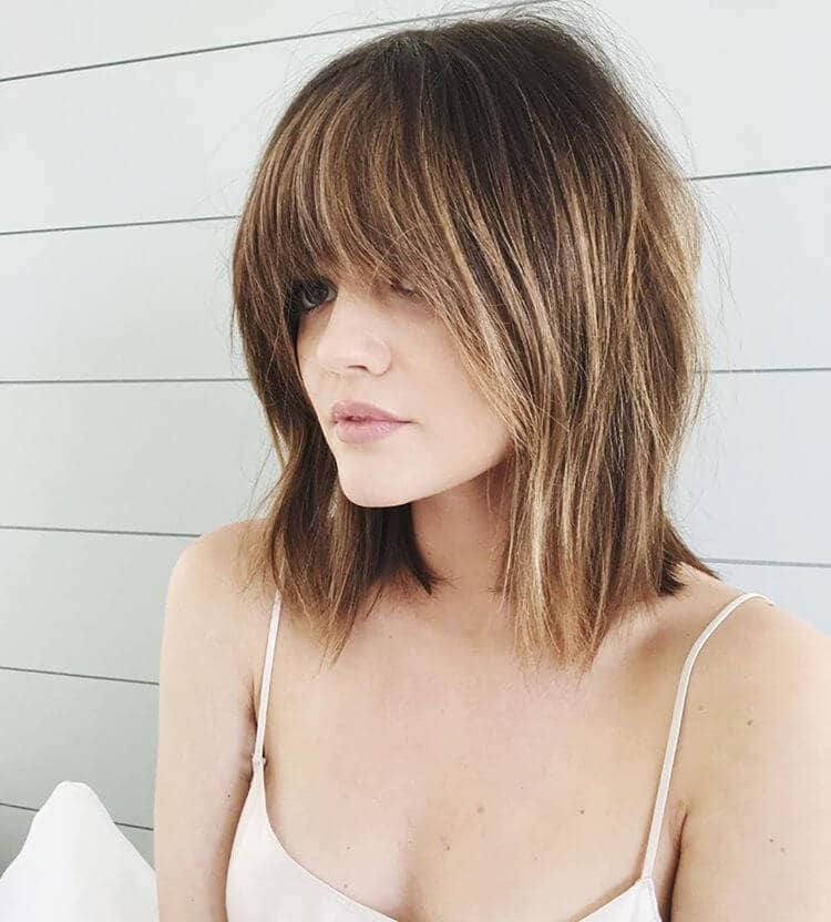 Shoulder Length Layered Hair With Bold Side Bangs