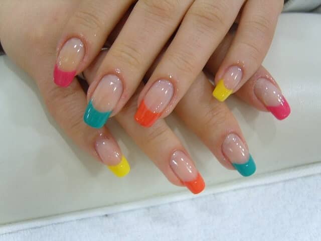 French Tips Manicure with Bold Tropical Colors