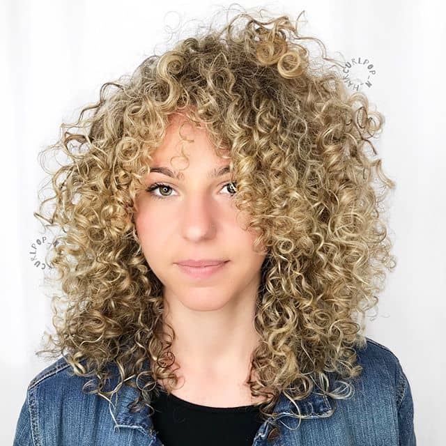Relaxed Rock And Roll Curly Hairstyles