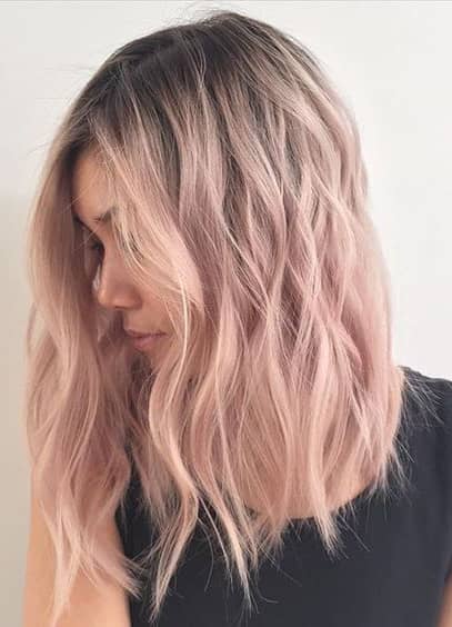 Subtle Pastel Pink Hair Highlights on Easy Medium Style