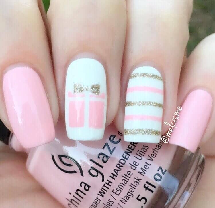 Adorable Pink Nails with Stenciled Accents