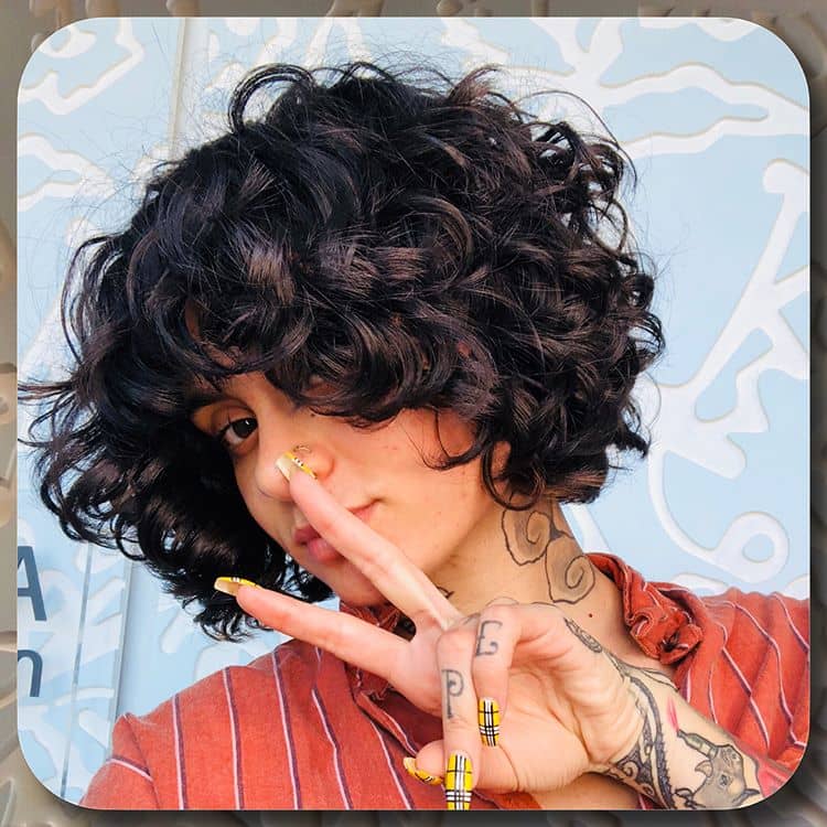 Short And Natural Curls With Curly Bangs