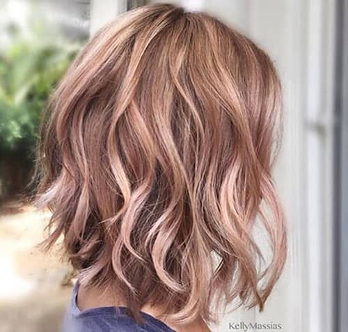 Pink and Blonde Highlights in Beachy Waves Rose Gold Hair