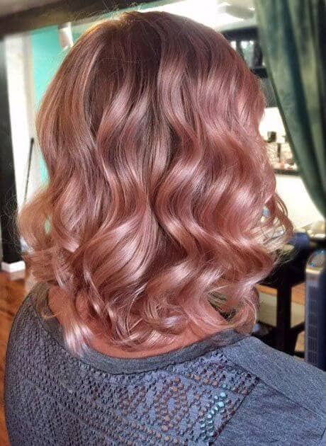 Rose Gold Hair Curls With a Glossy Shine