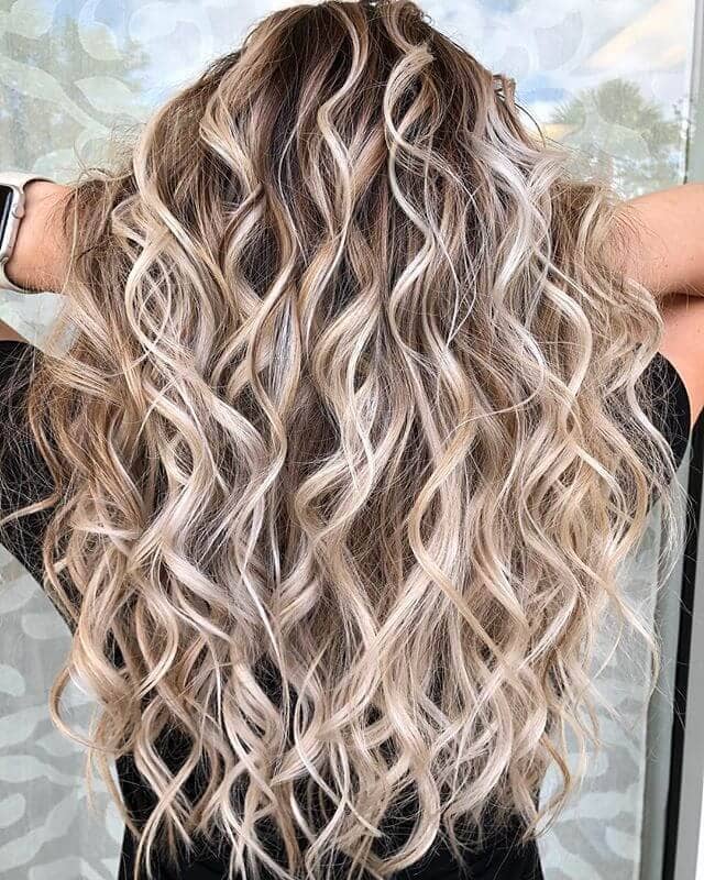 Perfectly Voluminous Blonde Spiral Curls