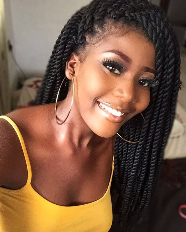 Black Braided Hairstyle With a Deep Side Part