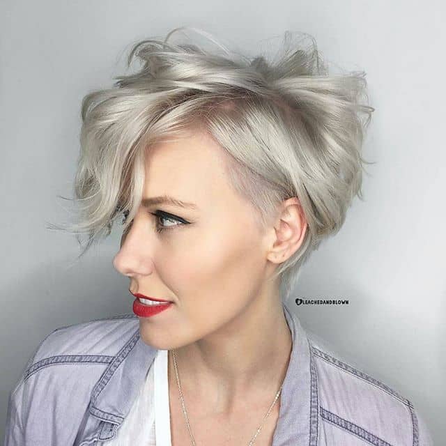 Soft Blond Asymmetrical Pixie With Side Sweep Curly Pixie Cut