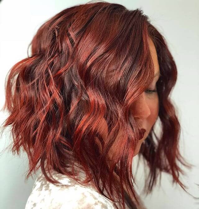 Tousled Angled Bob with Striking Cinnamon Highlights