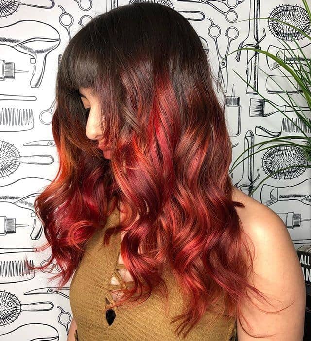 Long and Sultry Dark Brunette Ombre to Fiery Ember