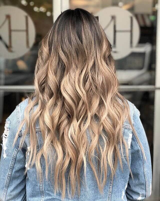 Tight Naturally Golden Wavy Locks