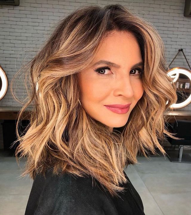 Broad Face Waves with a Blonde Ombre Short Cut