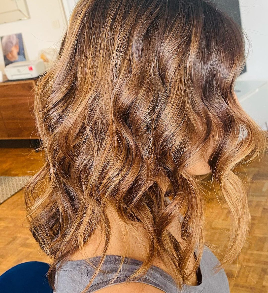 Asymmetric Brunette Curls with Medium-Length Hair