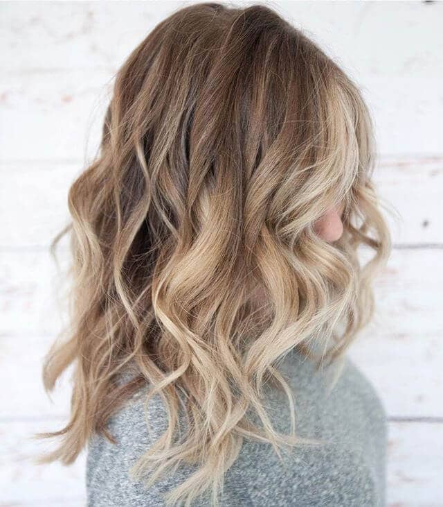 Full Wavy Layers with Streaks of Blonde and Brown
