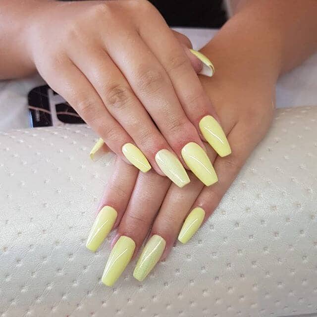 Sophisticated Pale Yellow Ballerina Nails