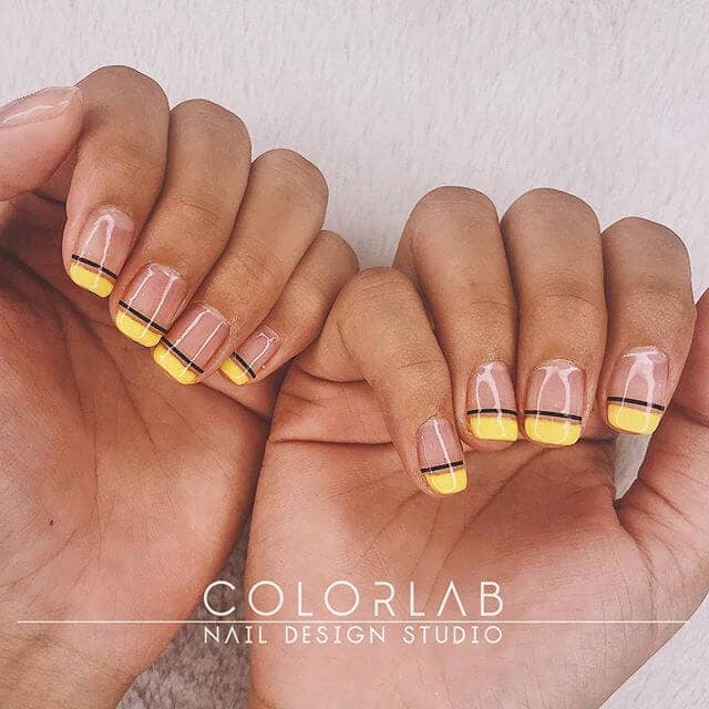 Shiny Clear Nails with Yellow Tips