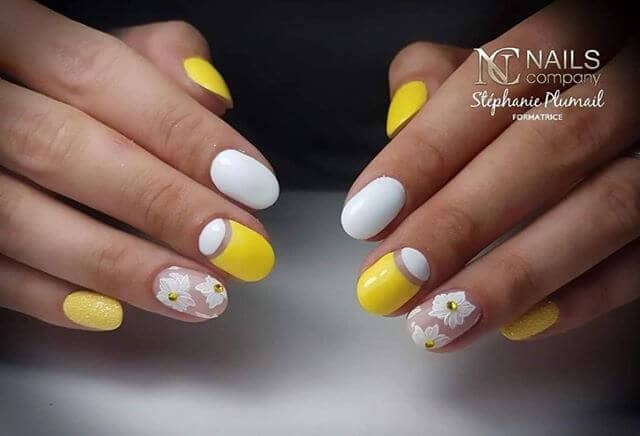 Yellow and White Nails with Flower Details