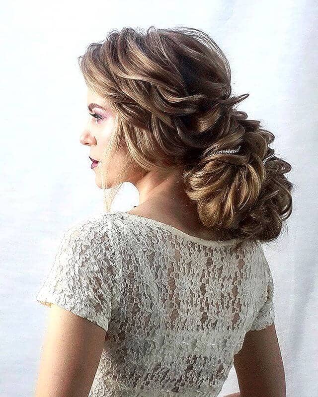 Voluminous Low Bun Woven With Braids