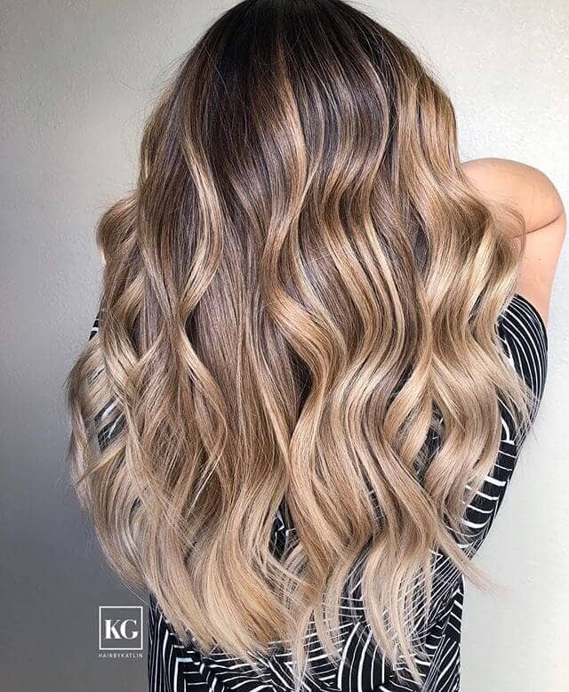 All Curled Up Brown Hair With Golden Highlights