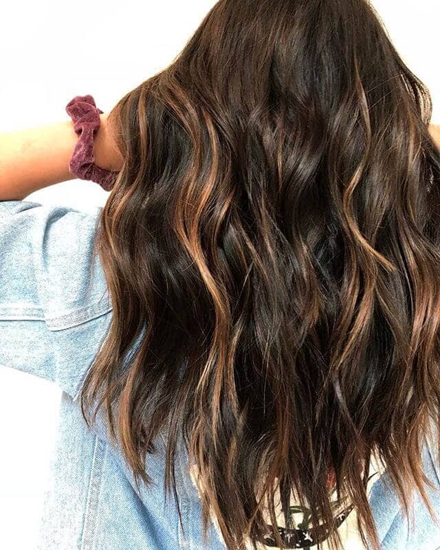 Dark Brown Hairstyle With Barely There Waves