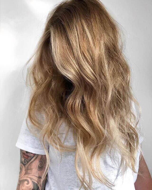 Dramatically Long, Voluminous Blond Curls