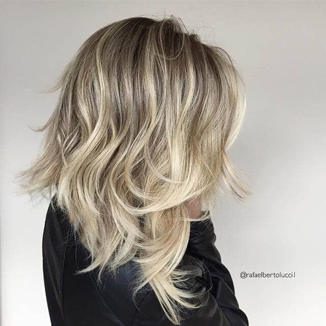 Messy and Layered Asymmetrical Long Bob