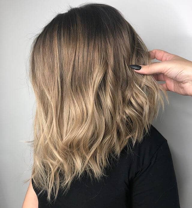 Textured Long Bob with Emphasized Asymmetry